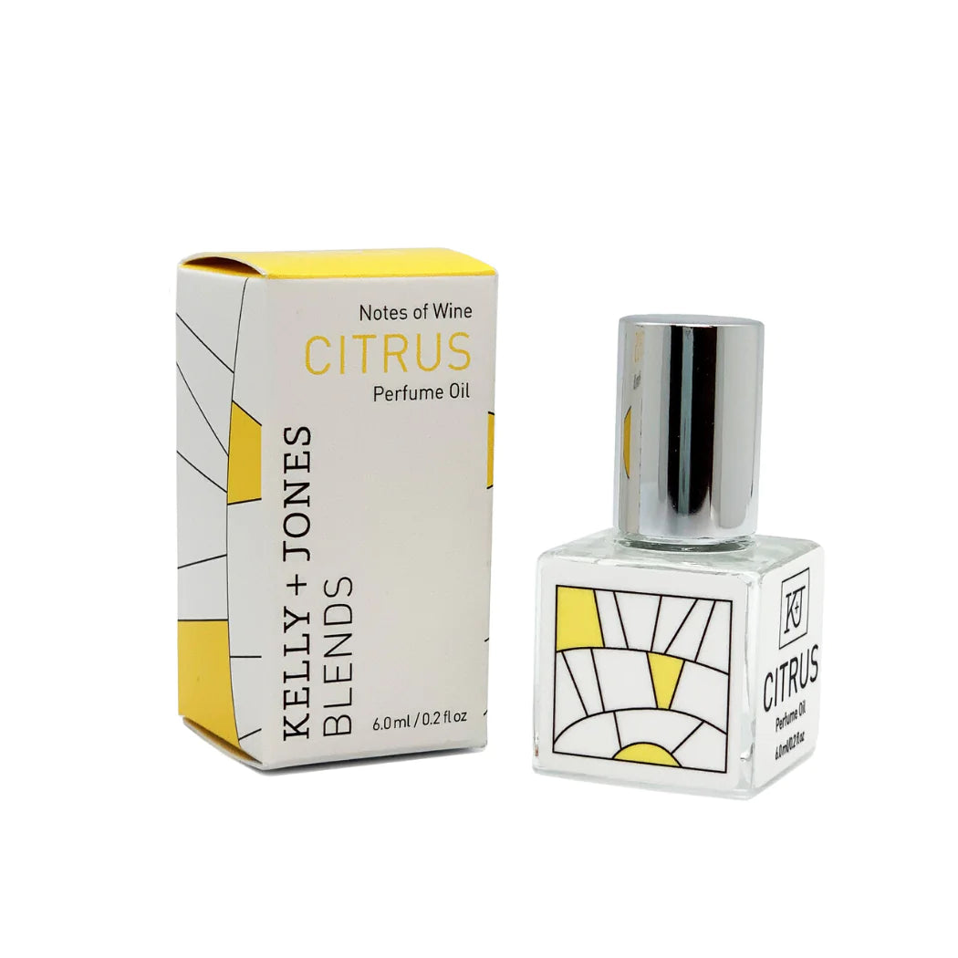 Kelly & Jones "CITRUS" perfume bottle: small, clear, square bottle with a long chrome lid top. Text reads "CITRUS Perfume Oil 6.0ml/0.2 fl oz", comes with small box.