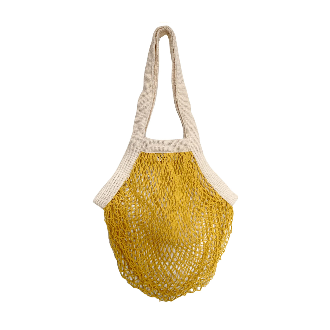 French Market Net Tote Bag with a yellow-colored base.