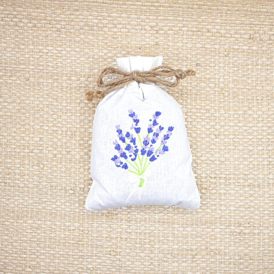 Lavender sachet with lavender embroidery and twine ribbon.