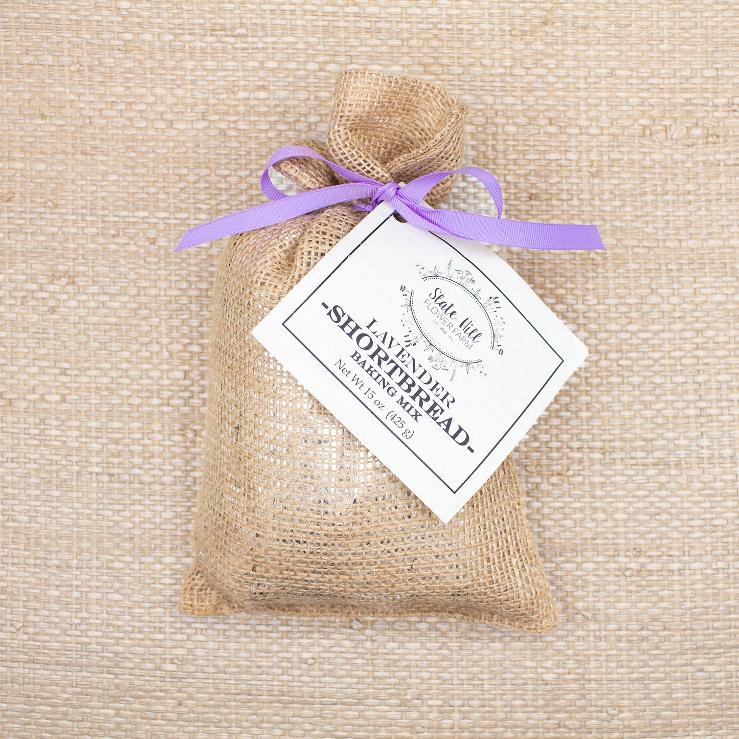 Lavender Shortbread Baking Mix, wrapped in burlap with a light purple ribbon.